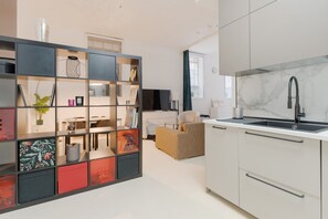 Living area - Elegant 88 sqm loft, perfect for up to 4 guests, located on the ground floor of a building (internal stairs lead to the lower level).The apartment is located in the Porta Vittoria district, a well-served residential area perfectly connected to all main s (Milan)