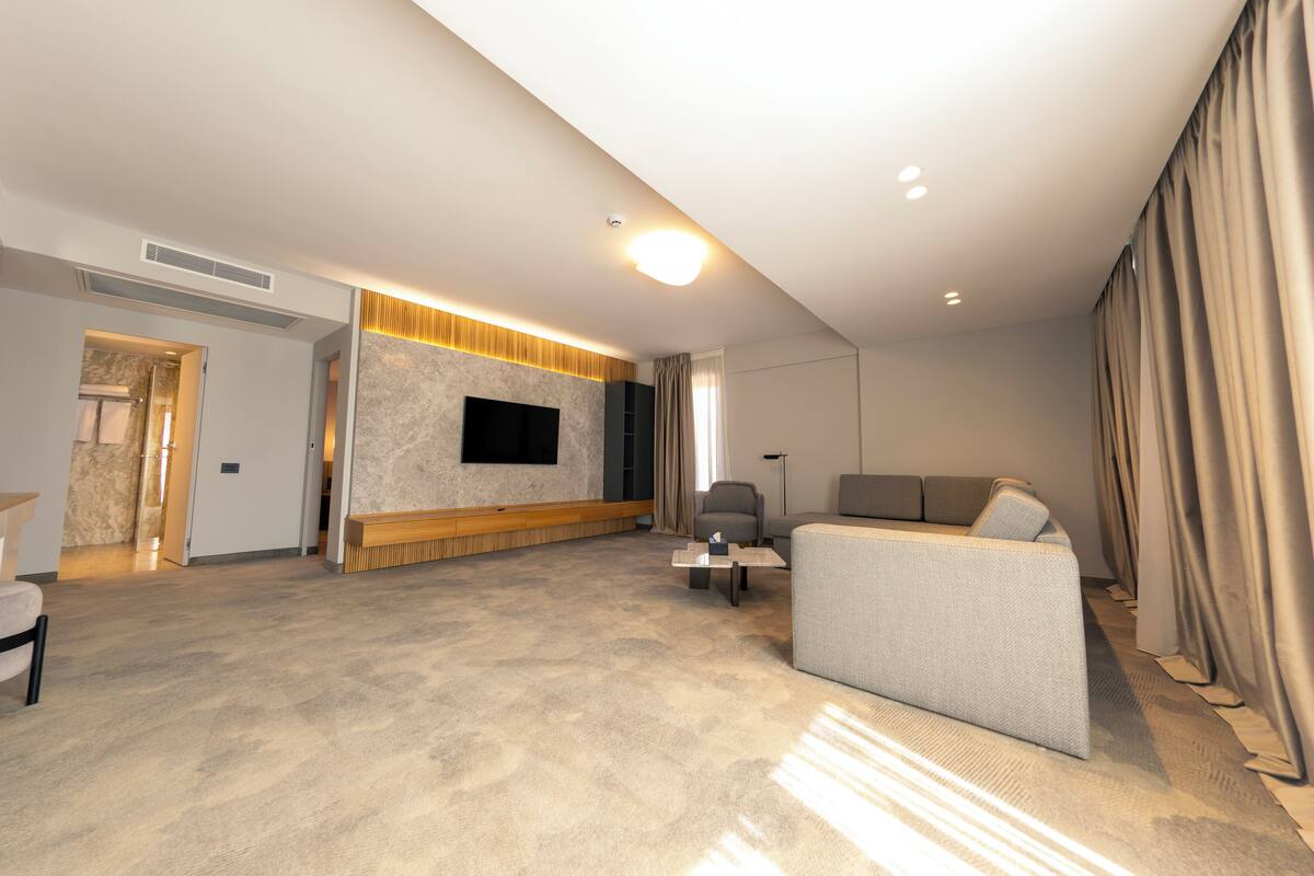 Superior Apartment, Balcony, City View | Living area | TV