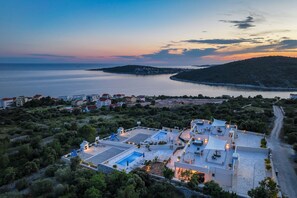 A coastal property with a swimming pool, outdoor seating, and a view of the sea. - Villa Sevid - Three Bedroom Villa, Sleeps 6 (Ostricka luka)