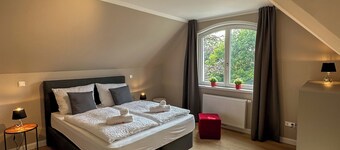 Riverside residence: old building charm, comfort & water views