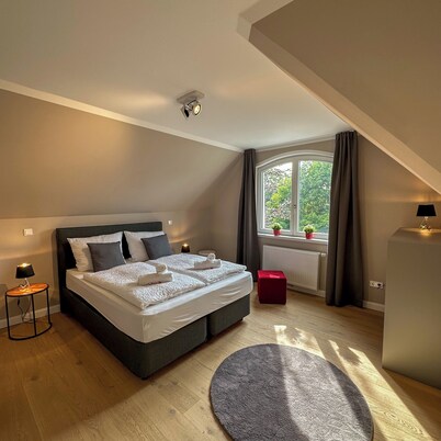 Riverside residence: old building charm, comfort & water views