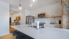 Fridge, microwave, oven, stovetop - Sunrise Loft at 1932 Reserve. Sleeps 6 in style! (Osage Beach)