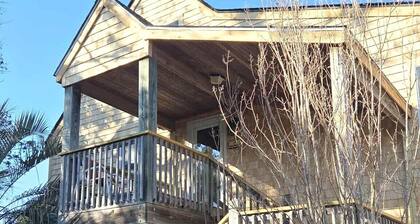 Second-floor two-bedroom villa with screened porch.