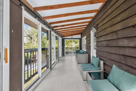 Terrace/patio. Spacious cabin w/private river, hot tub & fire pit