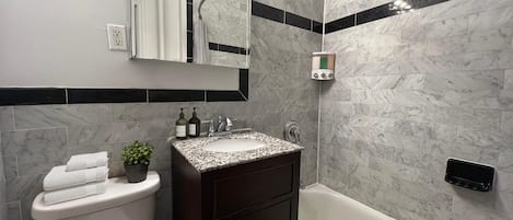 Hair dryer, towels, soap, toilet paper