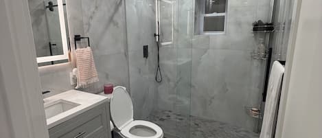 Hair dryer, towels, soap, toilet paper