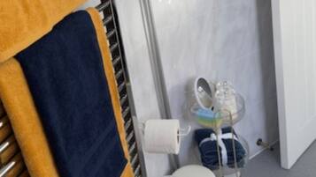 Hair dryer, towels, soap, toilet paper