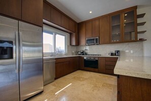 Fridge, microwave, oven, dishwasher - Beautiful Home with private rooftop and jacuzzi. (Cabo San Lucas)
