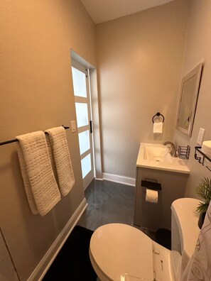 Hair dryer, towels, soap, shampoo