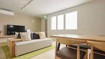 Comfort Condo, Non Smoking | Living area | 65-inch flat-screen TV with digital channels