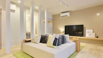 Comfort Condo, Non Smoking | Living area | 65-inch flat-screen TV with digital channels
