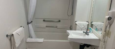 Hair dryer, towels, soap, toilet paper