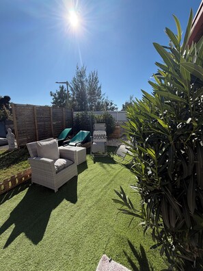 Family Triple Room, Patio, Garden View | View from room