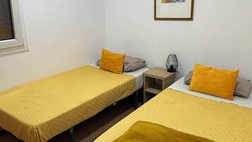 Family Triple Room, Patio, Garden View | Iron/ironing board, free WiFi