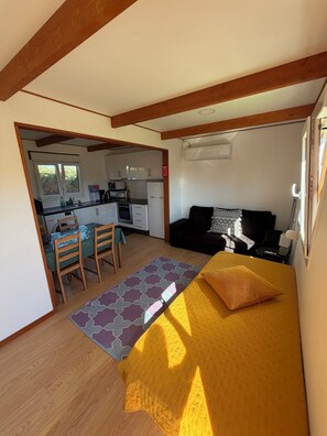 Family Triple Room, Patio, Garden View | Private kitchenette