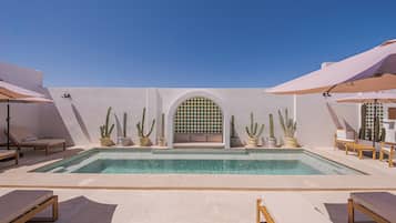 Outdoor pool, open 6:00 AM to 10:00 PM, pool umbrellas, pool loungers