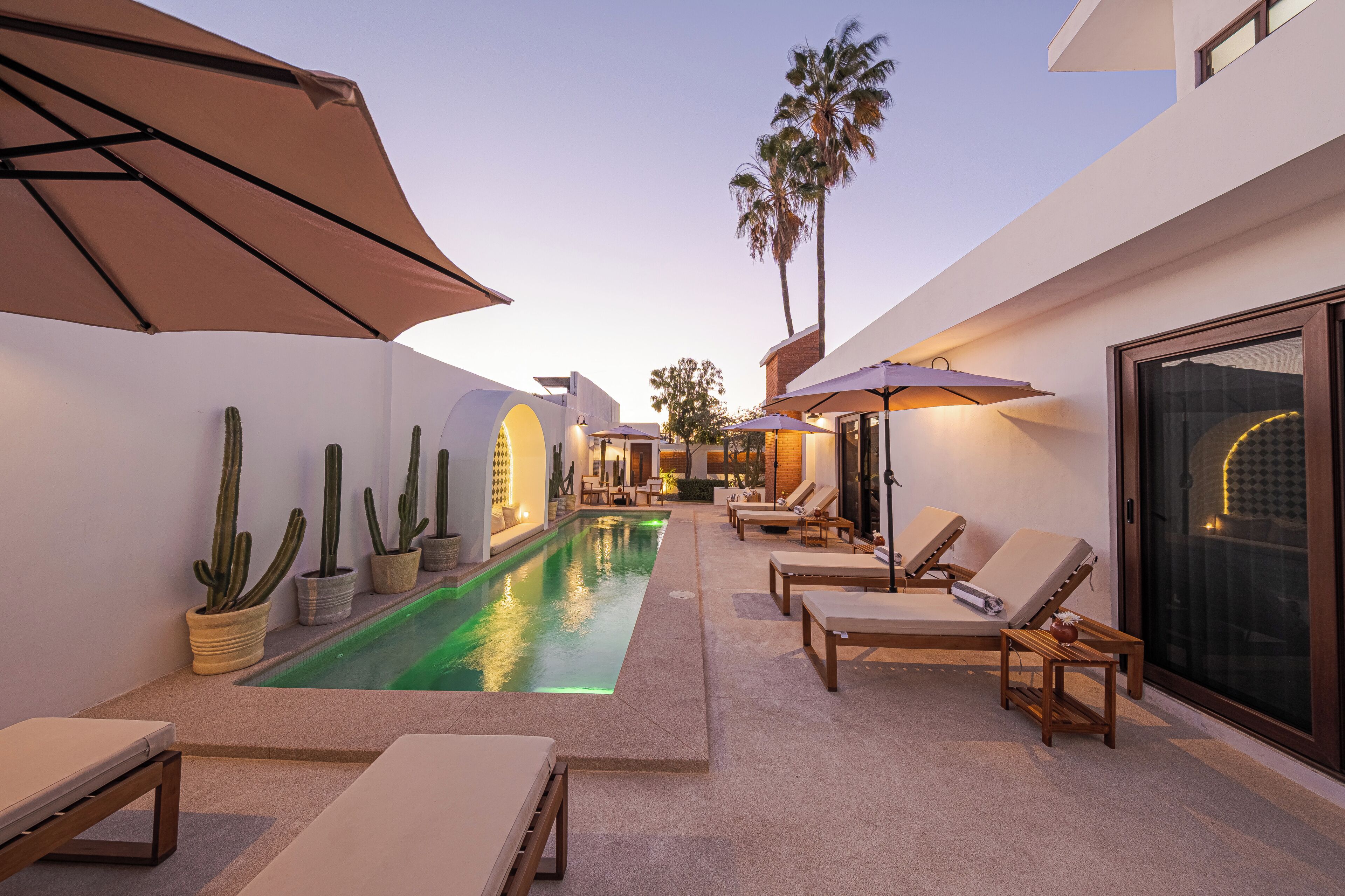 Outdoor pool, open 6:00 AM to 10:00 PM, pool umbrellas, sun loungers