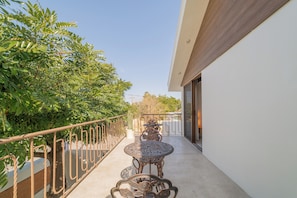 Habitación superior | Terraza o patio