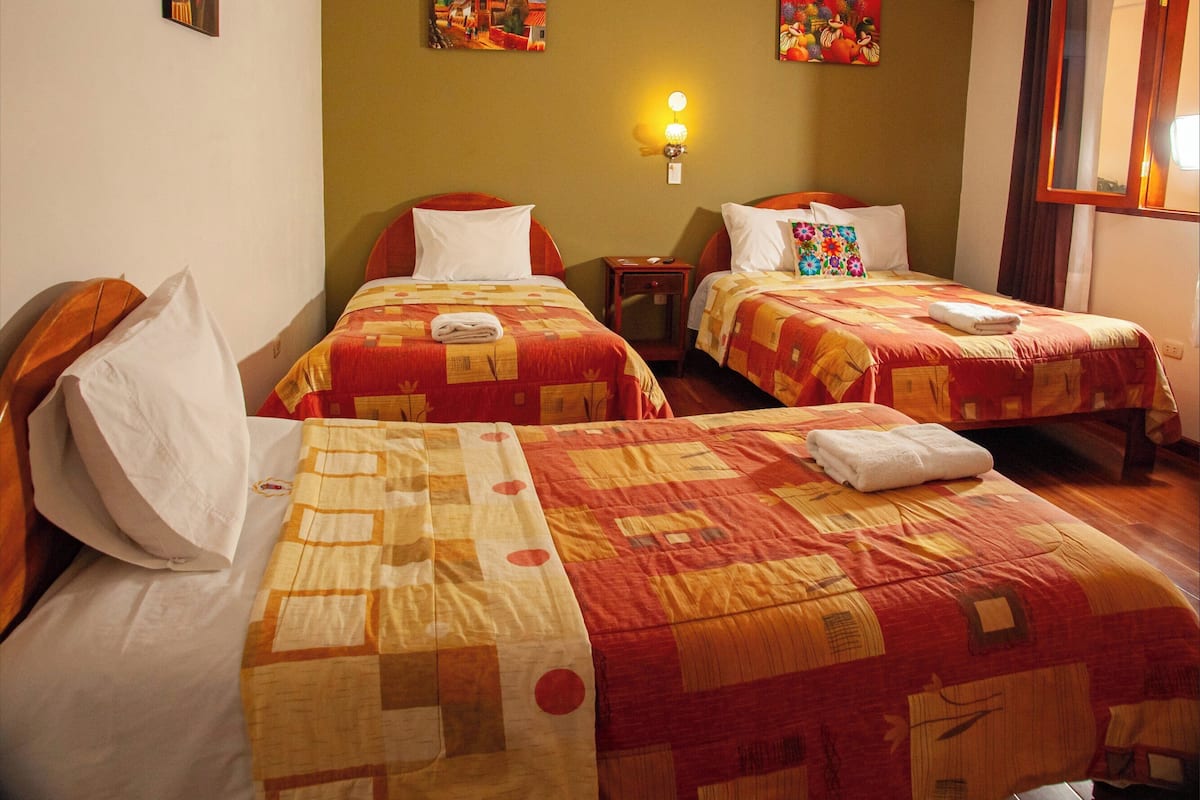 Standard Triple Room, Balcony, Courtyard View | Free WiFi