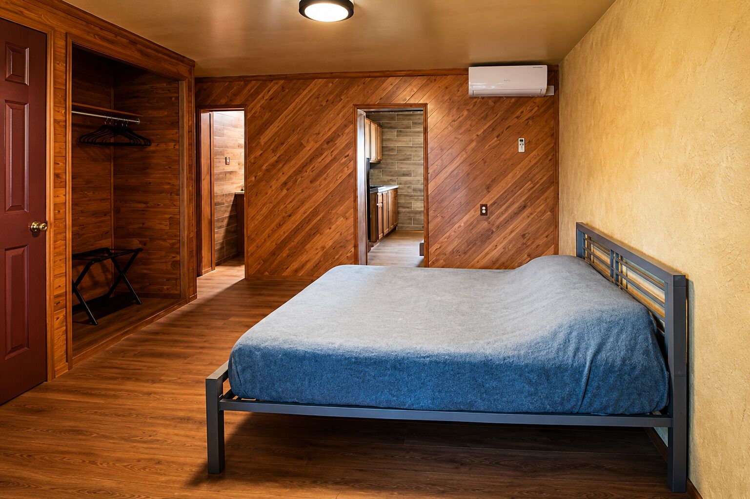 Desk, laptop workspace, bed sheets