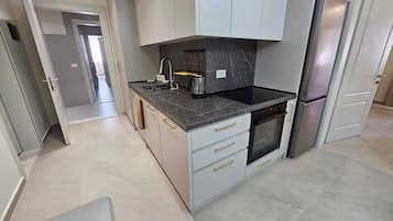 Apartament urbà, 1 dormitori, vistes a la ciutat | Cuina privada