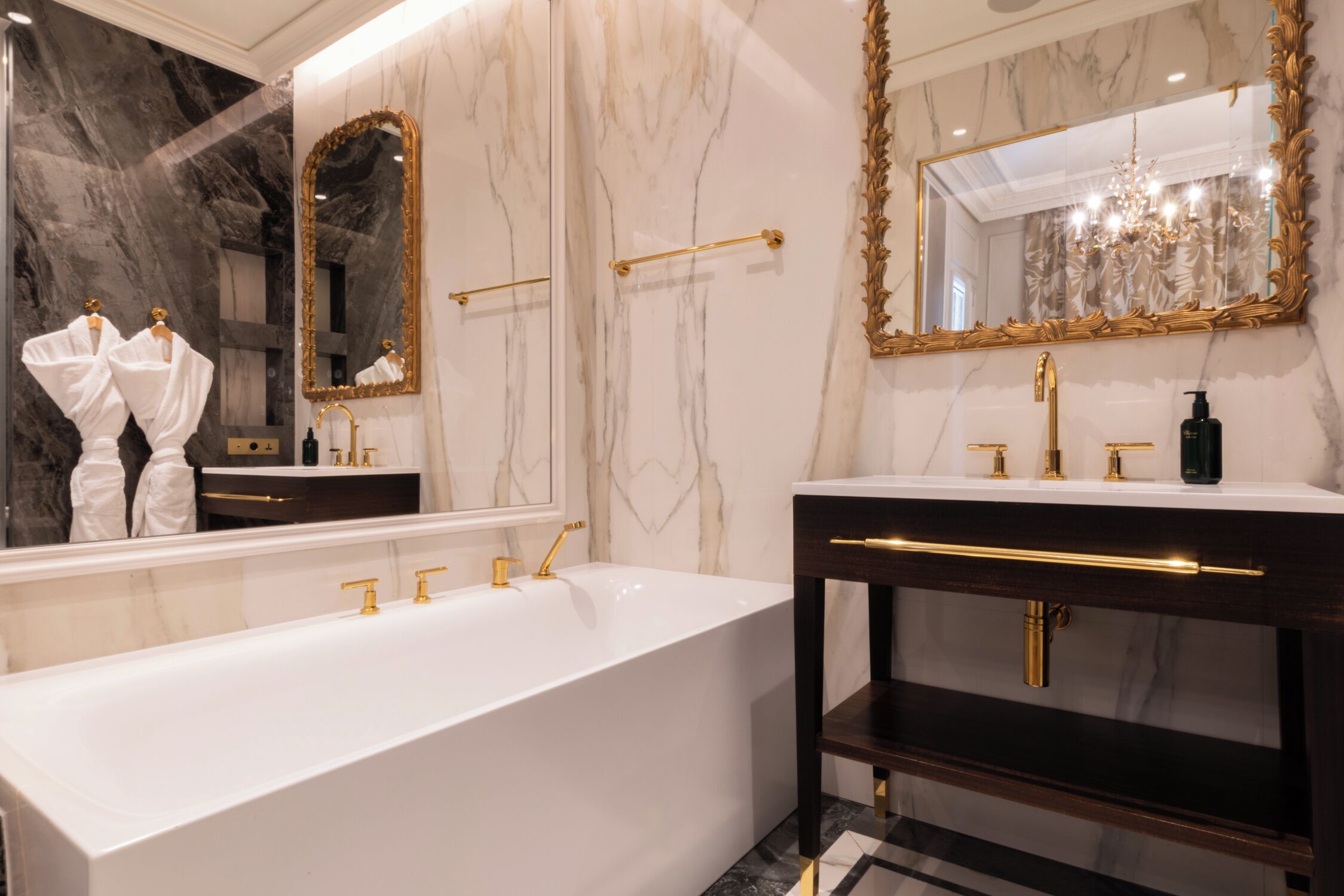 Designer toiletries, hair dryer, bathrobes, slippers