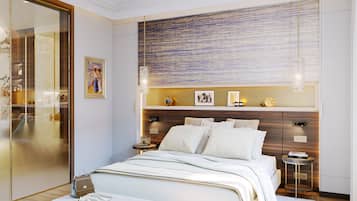 Une chambre moderne avec un grand lit, des tables de chevet, un banc et une grande fenêtre.