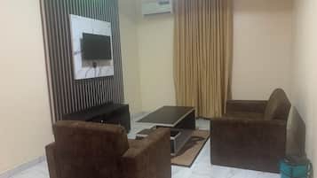 Suite Deluxe | Área de sala de estar