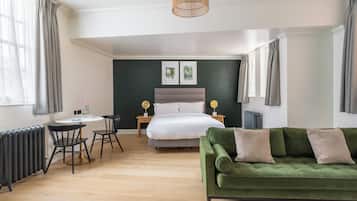 Extra Large Studio with Kitchen | Premium bedding, memory foam beds, in-room safe, individually decorated