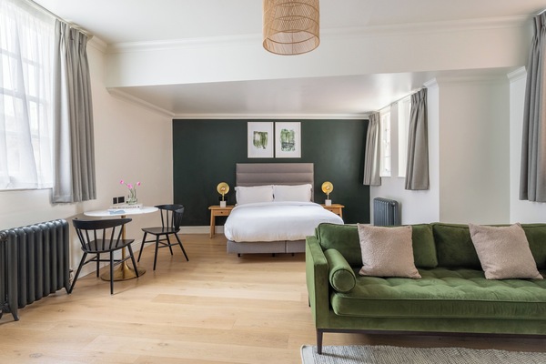 Extra Large Studio with Kitchen | Premium bedding, memory foam beds, in-room safe, individually decorated