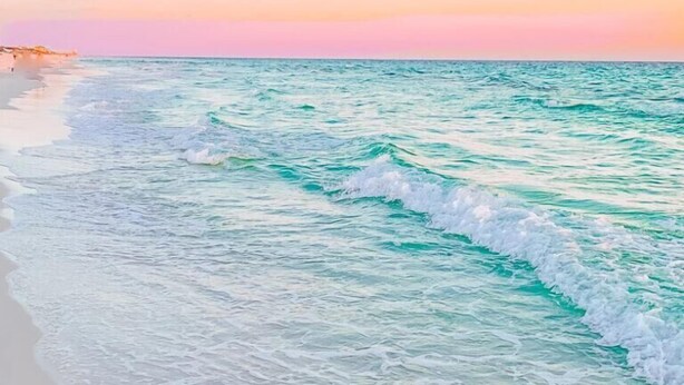 A beach with gentle waves and a clear sky. - Inlet Sands 105 (Panama City Beach)