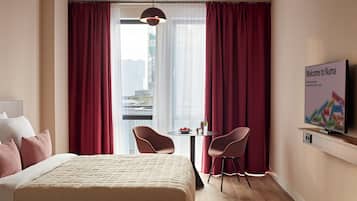 Premium bedding, in-room safe, blackout curtains, iron/ironing board