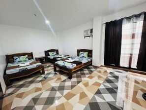 Classic Quadruple Room, Balcony, City View | Desk, laptop workspace, iron/ironing board, free WiFi - PANDA GUEST HOUSE (Coron)
