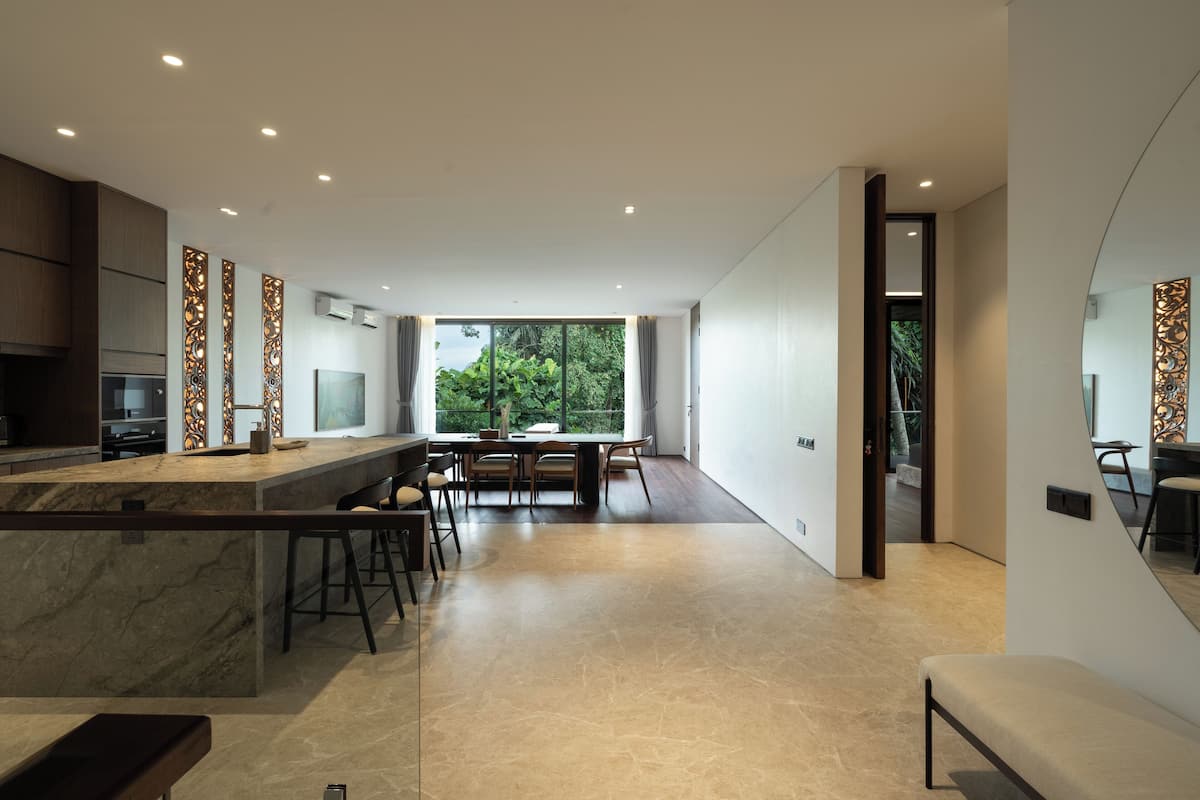 Deluxe Triple Room, Garden View | Living area