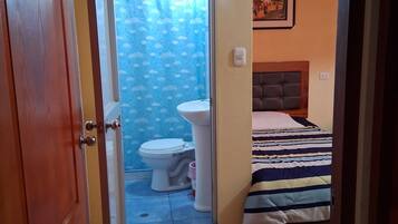 Triple Room, City View | Bathroom | Hair dryer, towels, soap, toilet paper