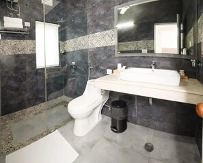 Deluxe Studio | Bathroom | Shower, free toiletries, hair dryer, towels - Bedchambers Suite Near Sector 29 (Gurugram)
