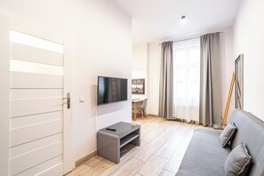 Apartment | Living area | Flat-screen TV - RentPlanet - Apartamenty Styczyńskiego (Katowice)