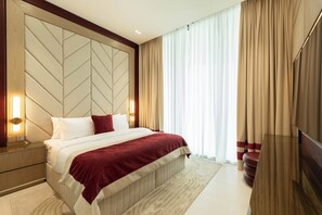 Departamento Deluxe, balcón | Ropa de cama de alta calidad y camas con efecto memoria