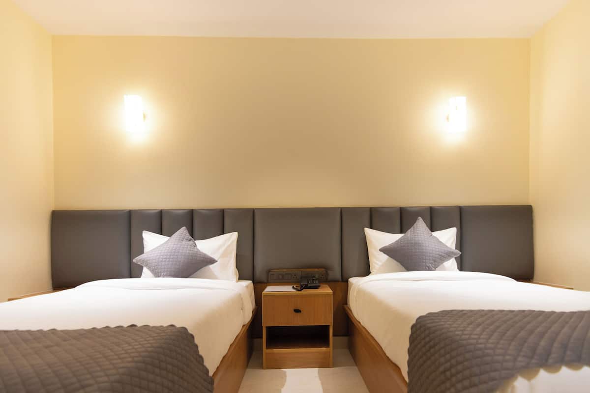 Chambre Exécutive avec lits jumeaux | Draps en coton égyptien, literie de qualité supérieure