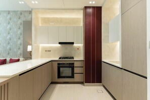 Apartment, Balcony | Private kitchen | Fridge, microwave, oven, stovetop - Binghatti Royale - Elite 1BR Suite  (Dubai)