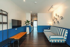 Suíte, 1 quarto | Área de estar