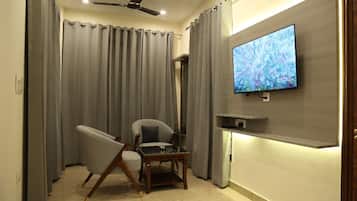 Luxury Suite, Balcony, Mountain View | Laptop workspace, iron/ironing board, free WiFi