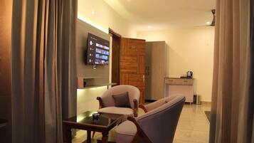 Luxury Suite, Balcony, Mountain View | Laptop workspace, iron/ironing board, free WiFi