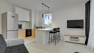 Apartment, Balcony | Private kitchenette | Coffee/tea maker, electric kettle