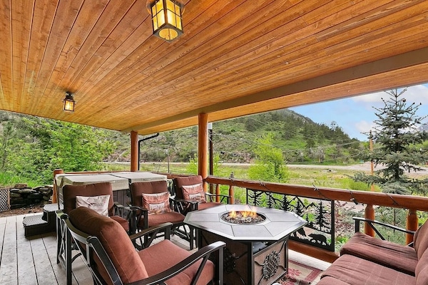 Covered deck with mountain views — perfect for morning coffee or evening drinks