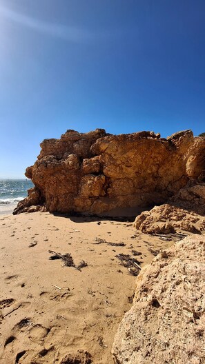 A rocky beach with clear blue sky. - Algarve house with patio & terrace, 2 bedrooms, near beaches, fully renovated (Parchal)