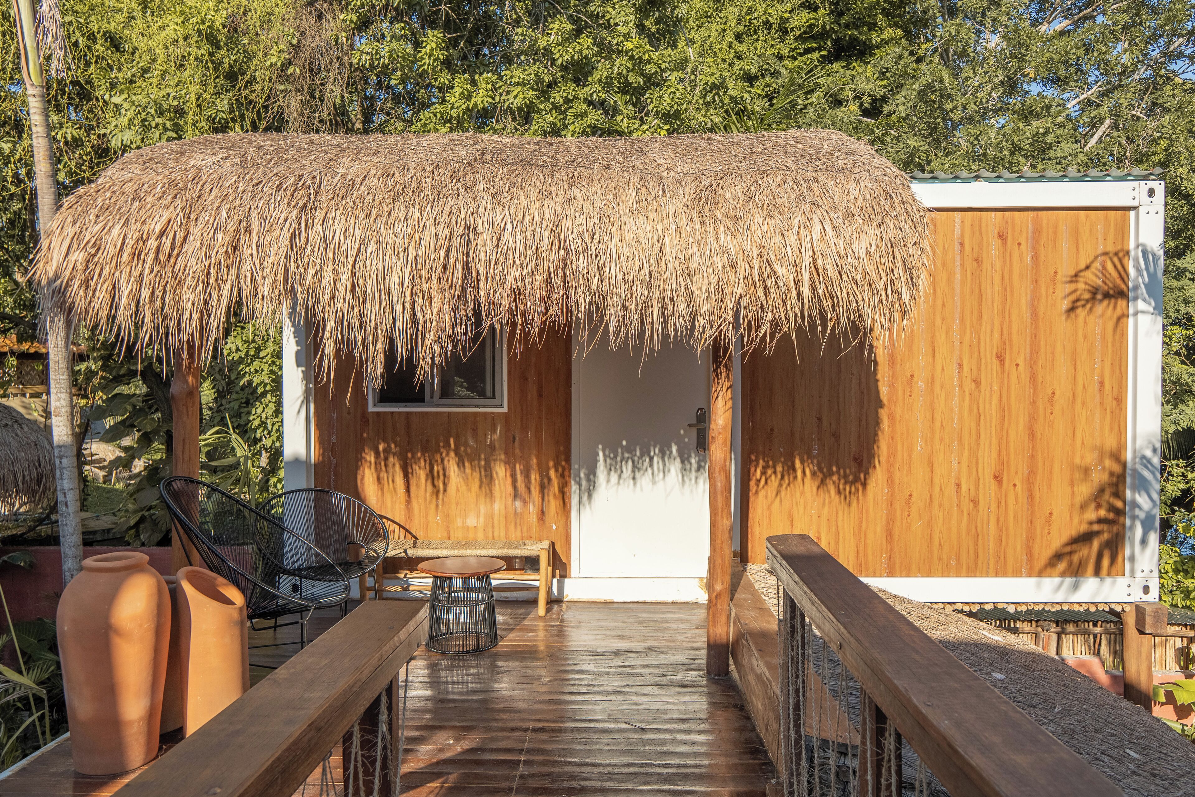 Habitación Deluxe, vista a la laguna | Área de sala de estar