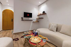 Chambre Quadruple Familiale, vue ville | Wi-Fi gratuit