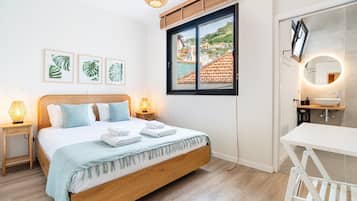 Fer et planche Ă repasser, accĂšs Internet, draps fournis