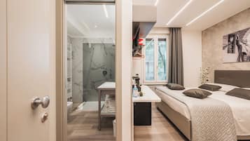 Comfort Triple Room, City View | Free minibar, in-room safe, desk, laptop workspace